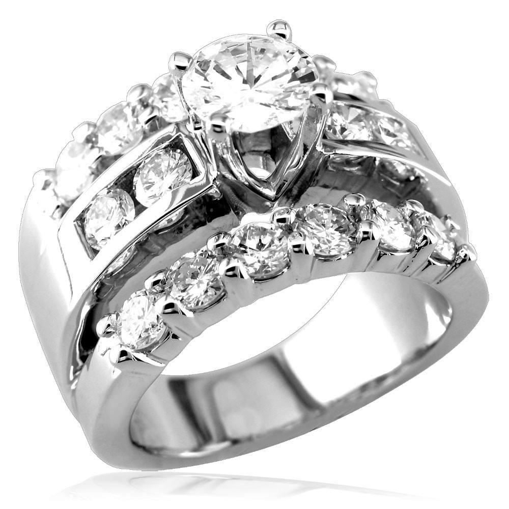 Wide Ring with 3 Rows Of Diamonds and a Round Diamond Center Stone LR-Z3219